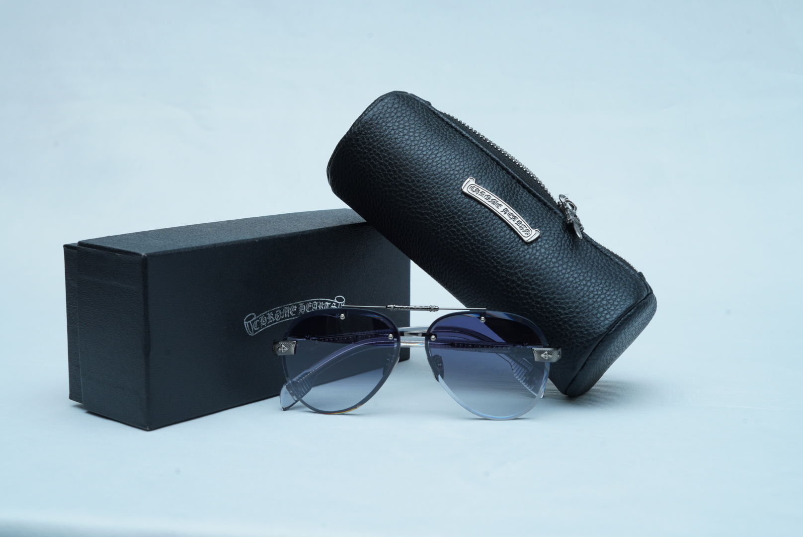 Chrome Hearts Luxury Men's Rimless Sunglasses - Silver Cross Accent Shades
